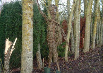 Woven willow figure at Willows Nursery. Woven willow bulrush decorations using corn dolly weave at Willows Nursery. Buy willow to make.
