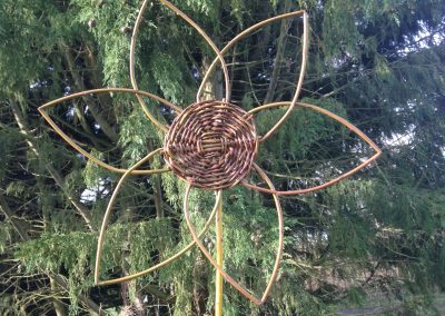 Easy willow project. Woven willow flower at Willows Nursery. Willow garden decoration. Woven willow bulrush decorations using corn dolly weave at Willows Nursery. Buy willow to make.