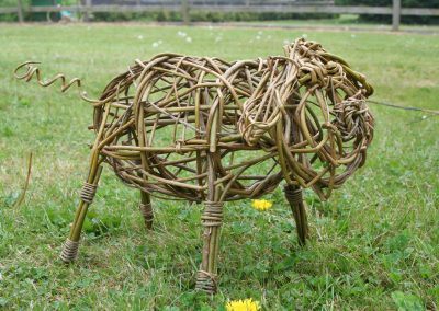 Woven willow pig at Willows Nursery. Woven willow bulrush decorations using corn dolly weave at Willows Nursery. Buy willow to make.